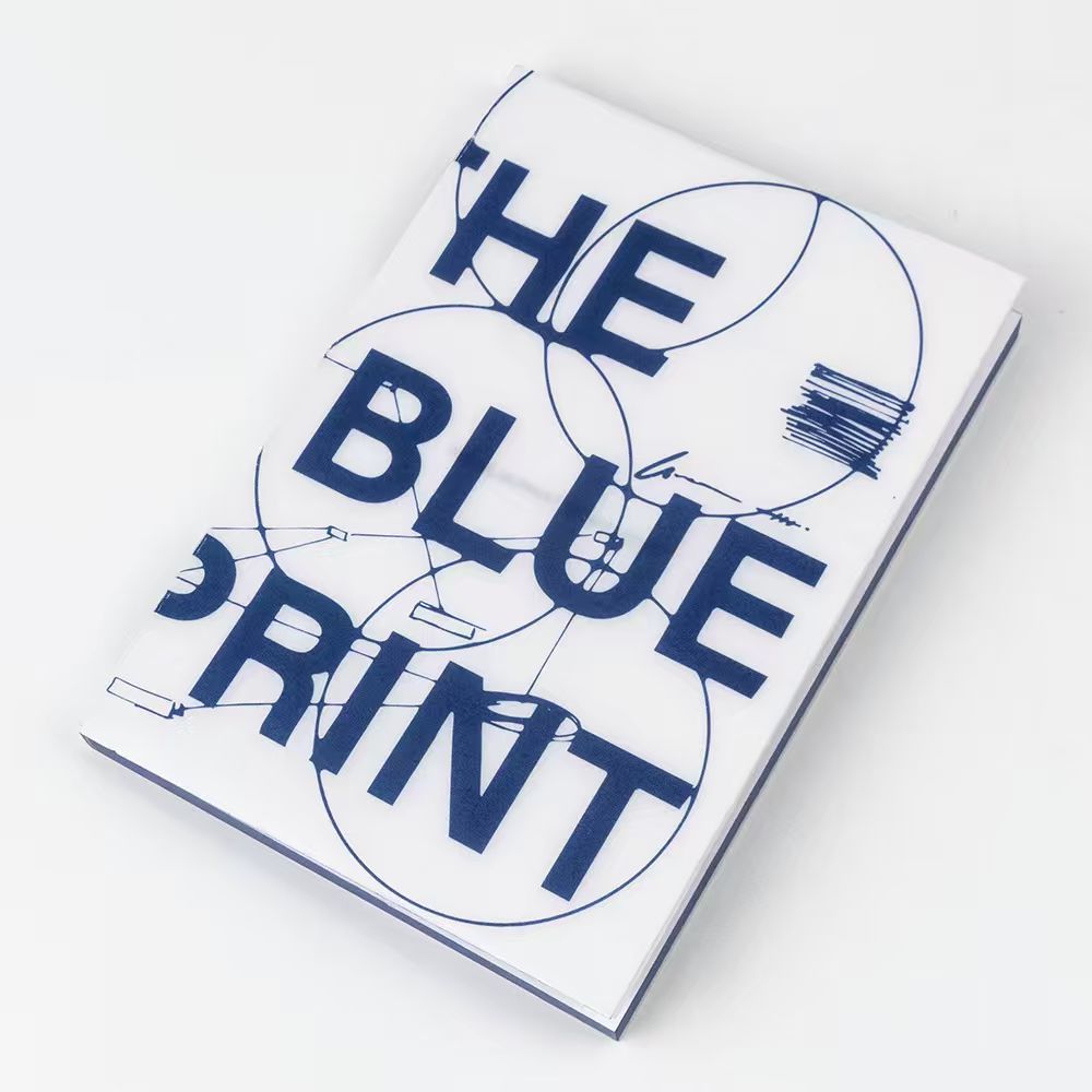 Book titled 'The Blueprint' with geometric design on a white background